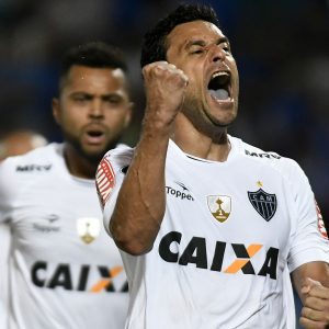 Bazil's Atletico Mineiro player Fred (R) celebrates after scoring a goal against Argentina's Godoy Cruz during their Copa Libertadores 2017 football match at Malvinas Argentinas stadium in Mendoza, Argentina, on March 8, 2017. / AFP PHOTO / Andres Larrovere        (Photo credit should read ANDRES LARROVERE/AFP/Getty Images)
